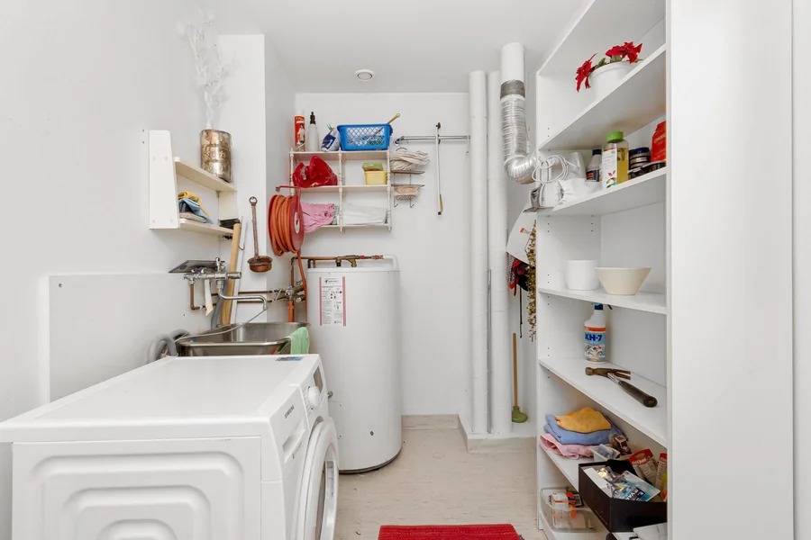 Water heater in a household laundry room